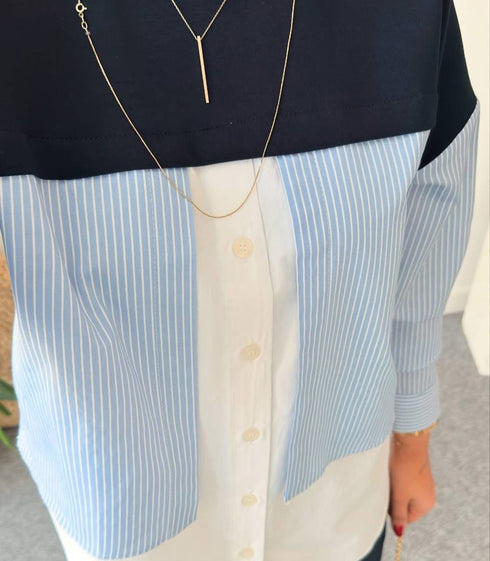 قميص نسائي باللون الأزرق