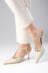 حذاء بكعب مفتوح من الخلف بلون البيج
