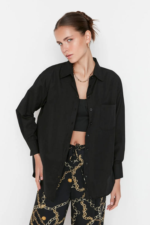 قميص قصّة واسعة باللون الأسود
