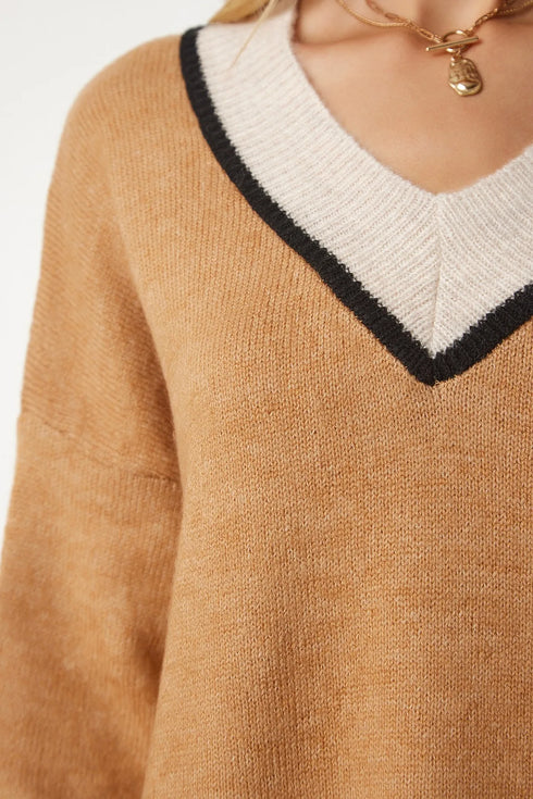 كنزة تريكو لون كميل