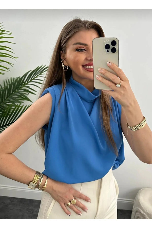 بلوزة نسائية لون أزرق