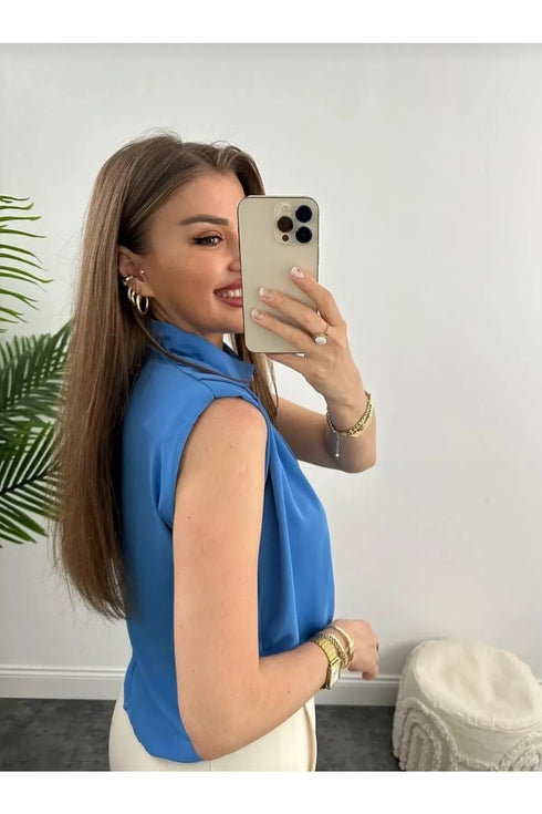 بلوزة نسائية لون أزرق