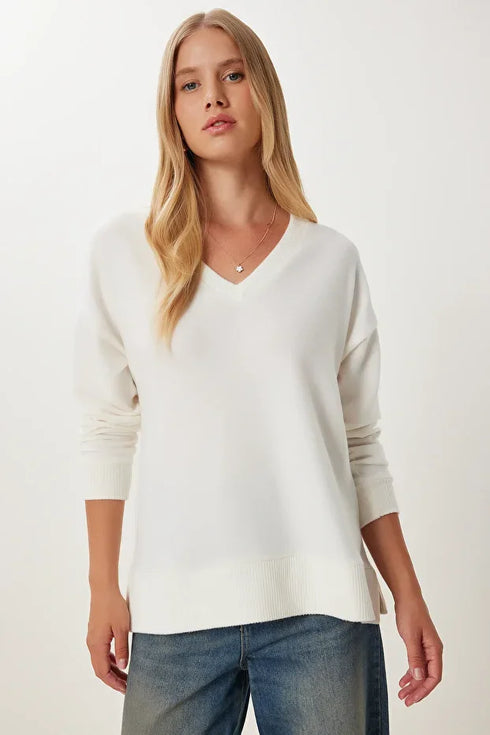 كنزة تريكو باللون البيج الفاتح