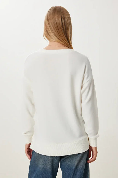 كنزة تريكو باللون البيج الفاتح