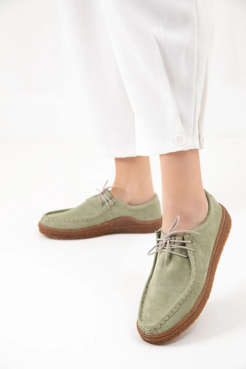 حذاء لوفر نسائي باللون الأخضر