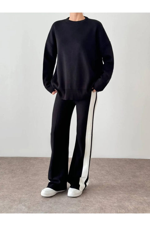 طقم نسائي عملي باللون الأسود