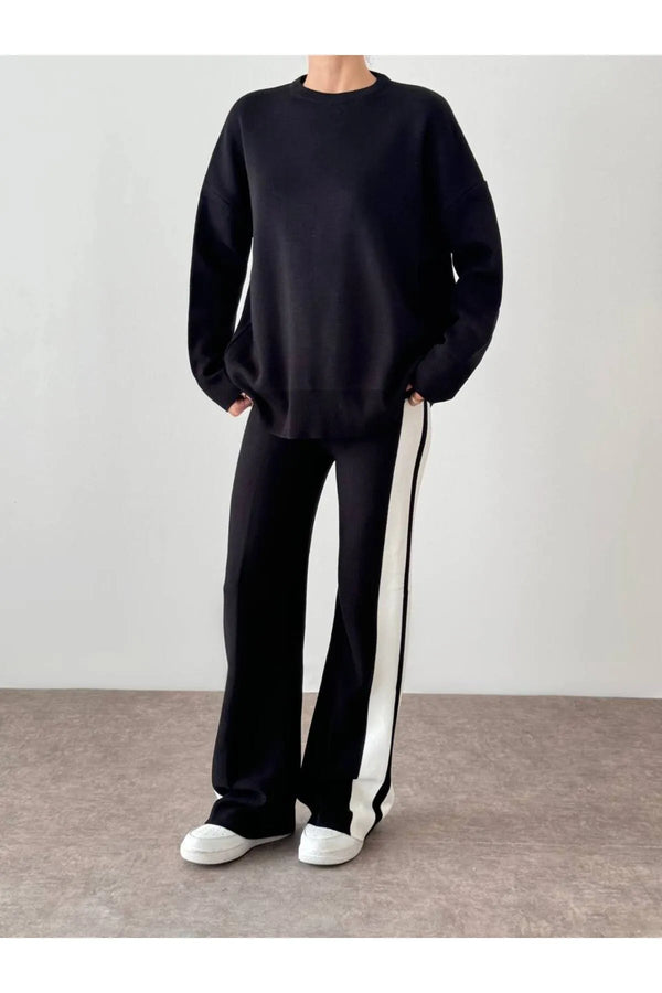 طقم نسائي عملي باللون الأسود