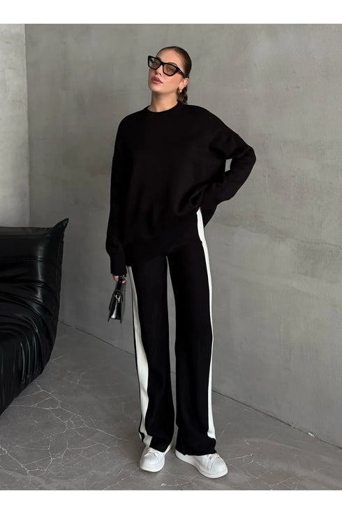 طقم نسائي عملي باللون الأسود