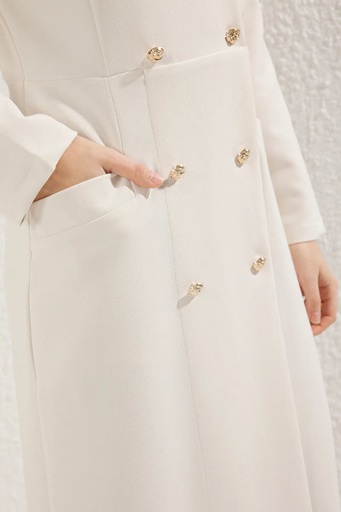 فستان نسائي بيج بأزرار ذهبية