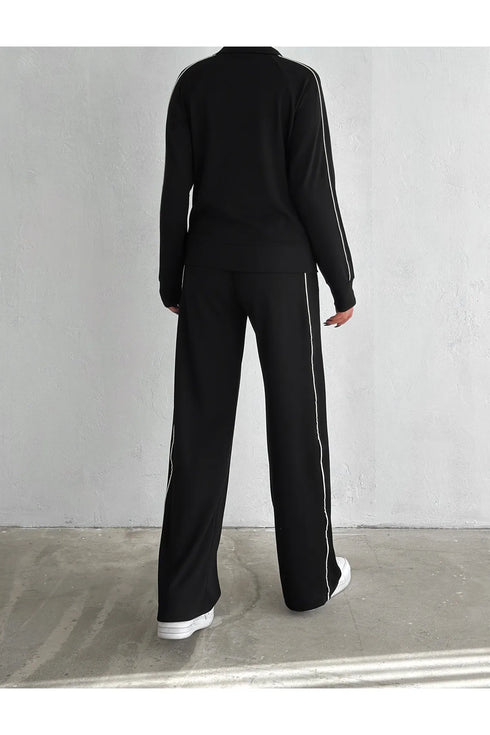 طقم جاكيت وبنطلون لون أسود