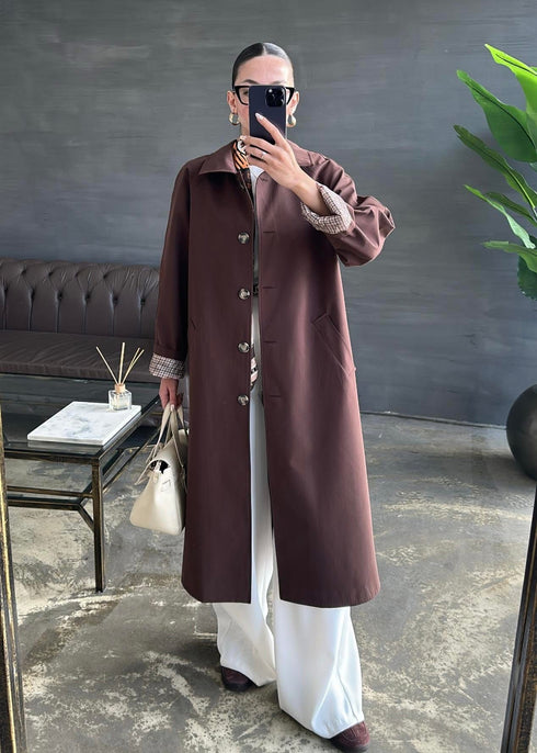 ترانشكوت طويل باللون البني